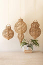 WOVEN SEAGRASS AND IRON ORNAMENTS